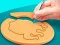 Juego Juego del calamar: Puzzle de galletas en línea